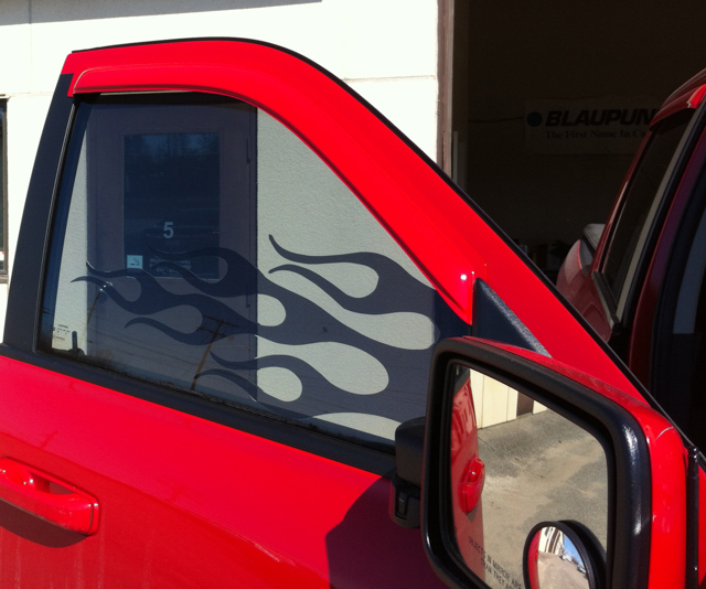 Dodge Ram Flames with professional window tint in North Bay